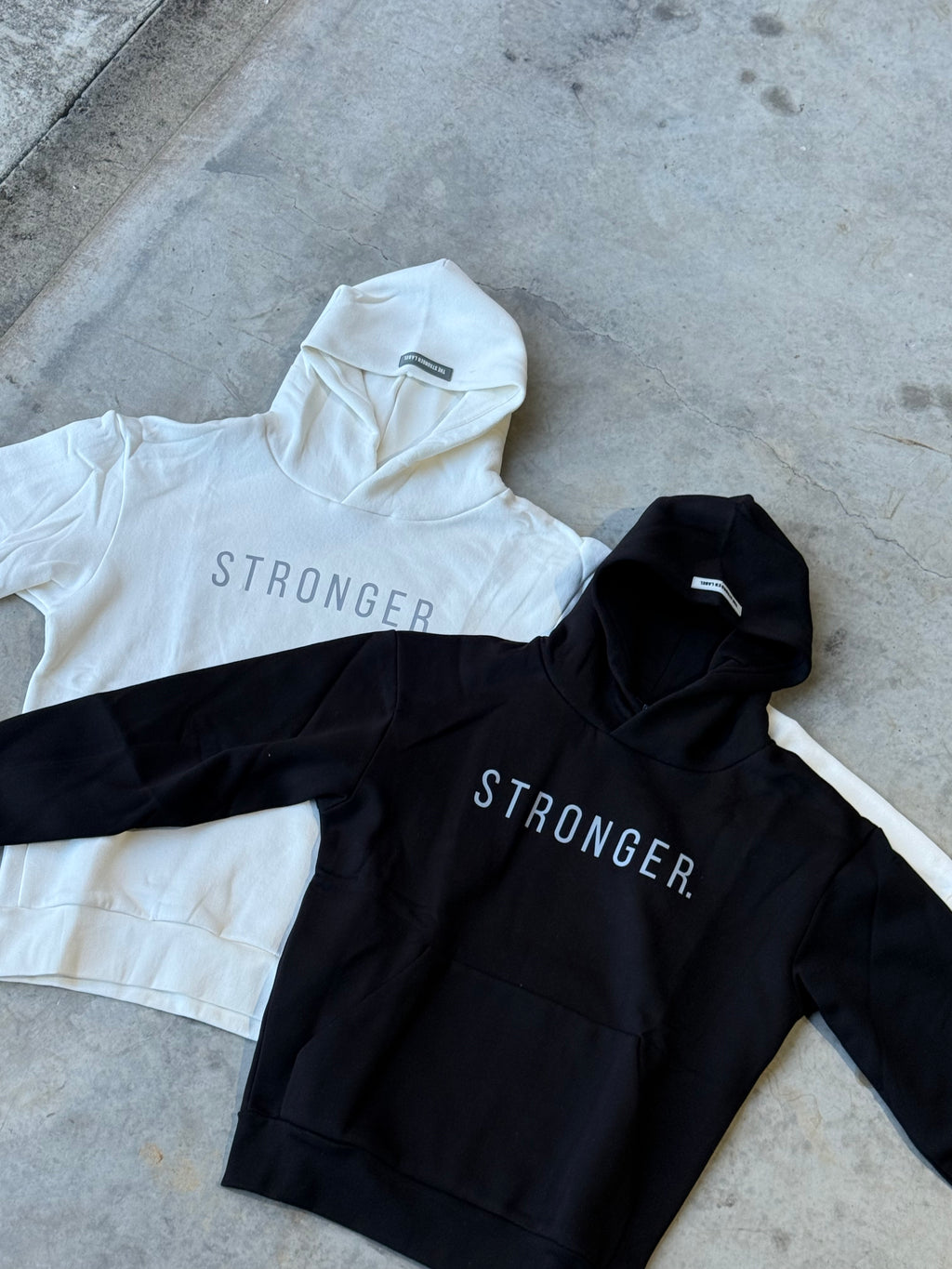 High View of Black And White TSL Warm-Up Pump Cover front side, laid flat, side by side – oversized gym long sleeve hoodie teefrom Australian activewear brand